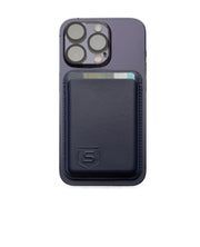 navy blue slim wallet with embossed S shield logo attached to iPhone