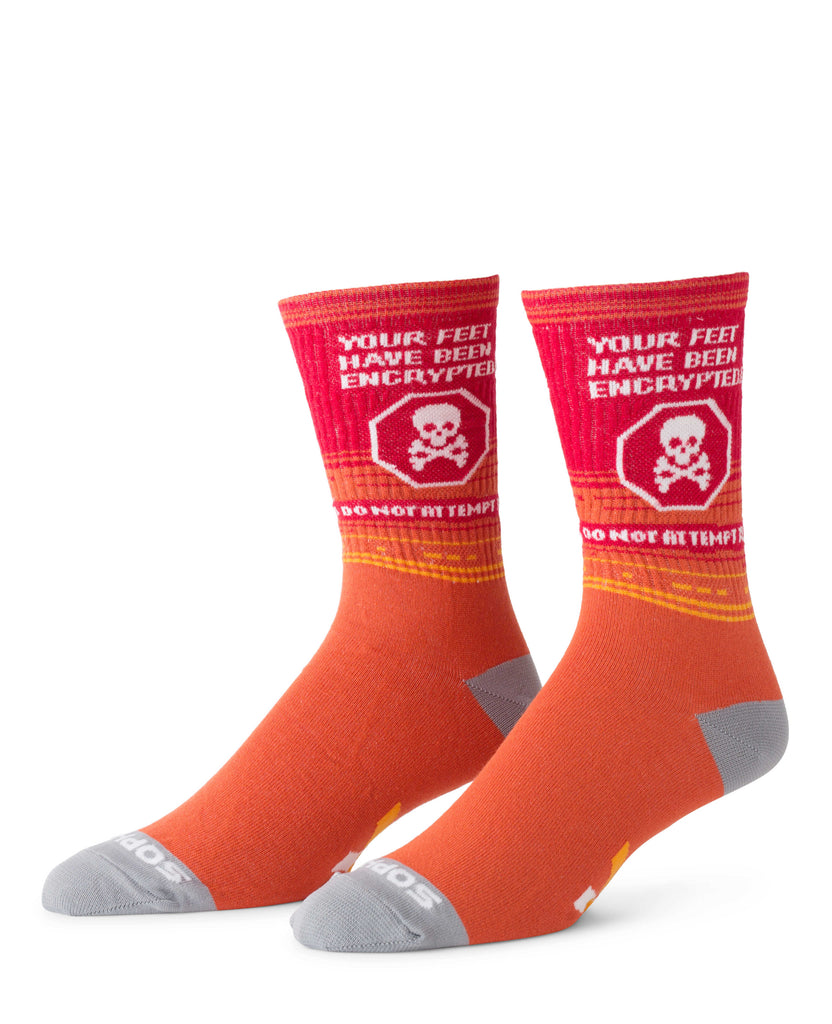 red socks with "your feet have been encrypted" white text and skull and crossbones danger sign