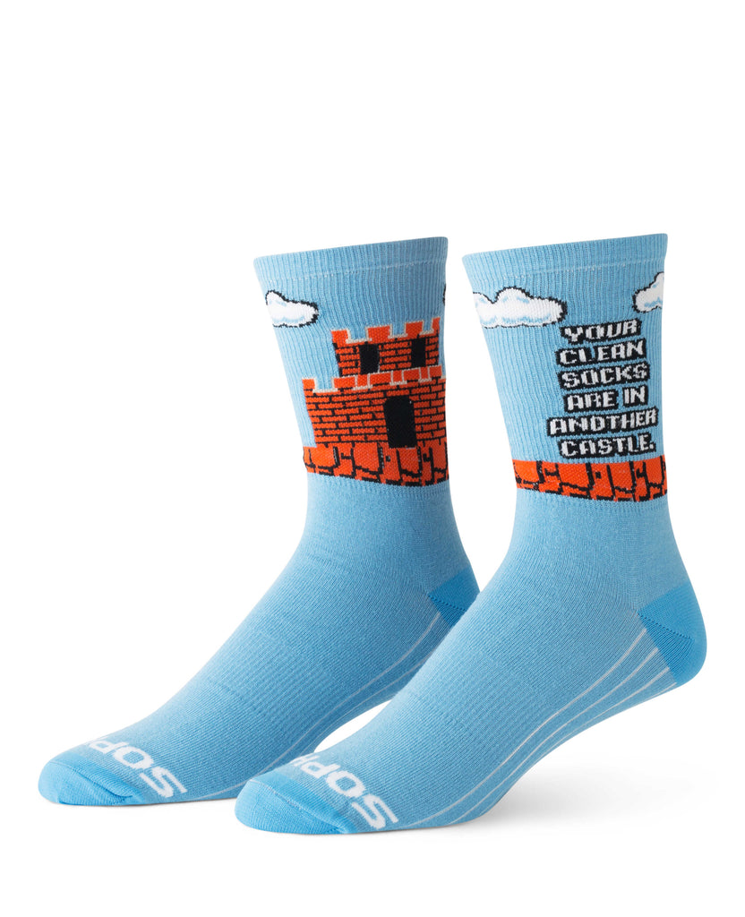 light blue socks with castle design and white text